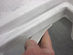 breaking cut edge with sandpaper