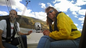Friends Gary & Nancy, both weather PFDs, sailing with me on AIR BORN on Lake Dillon, Colorado.